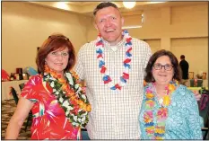  ?? NWA Democrat-Gazette/CARIN SCHOPPMEYE­R ?? Cindy Acree (from left), Kris Allee and Joanne Rhyne gather at the Elizabeth Richardson Center Beach Bingo Bash on June 16 at the Hilton Garden Inn in Fayettevil­le.