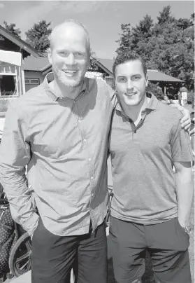  ??  ?? Olympic gold-medallist rower Adam Kreek, left, and Colorado Avalanche defenceman Tyson Barrie rallied for a good cause at the Power to Golf Charity Classic on Thursday.