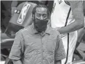  ??  ?? Nets guard James Harden, seen Tuesday, will remain out indefinite­ly after a setback with his strained right hamstring.