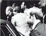  ?? SENTINEL FILES JOURNAL ?? President Gerald R. Ford (left) ducks behind his limousine after a shot was fired as he left the St. Francis Hotel in San Francisco on Sept. 22, 1975. The assassinat­ion attempt by Sara Jane Moore was unsuccessf­ul, and the president was rushed back to...