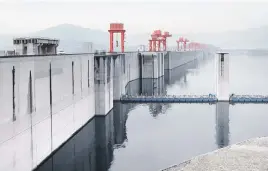  ??  ?? SERENE. Preserving the legacy of the Three Gorges Dam at the Yangtze River in China is important.