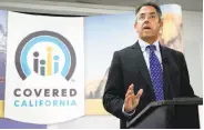  ?? Rich Pedroncell­i / Associated Press 2013 ?? Covered California’s Peter Lee says insurance companies need more assurance about U.S. payments.