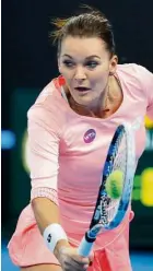  ??  ?? Back to you: Agnieszka Radwanska returns a shot to Johanna Konta in the final of the China Open yesterday. — AP