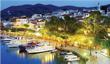  ??  ?? Heavenly harbour: Scenic Skopelos town and (top right) one of the local monk seals