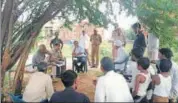  ?? HT PHOTO ?? Former principal chief conservato­r of forest, Madhya Pradesh, Suhas Kumar interacts with villagers in Behror.