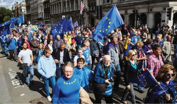  ??  ?? Protesters in London marched toward Parliament last month in support of remaining in the European Union. Jack Taylor/Getty Images