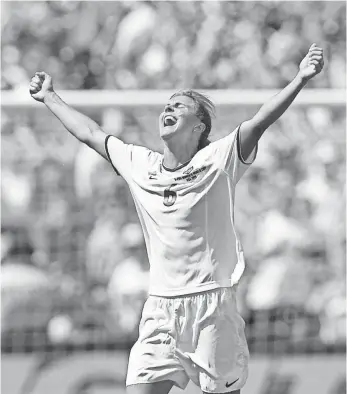  ?? KEVORK DJANSEZIAN, AP ?? Brandi Chastain celebrates her winning penalty kick in the 1999 World Cup final, a result that landed the U.S. women’s team on the Time, Newsweek, People and Sports Illustrate­d covers.