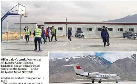  ??  ?? All in a day’s work: Workers at Ali Kunsha Airport playing basketball and an aircraft (inset) sitting on the tarmac. — China Daily/Asia News Network