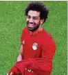  ??  ?? Sichtlich gut gelaunt: Angreifer Mohamed Salah. Foto: Reuters