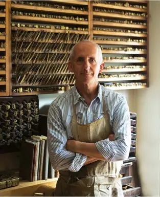  ?? Interview by Jessica Carpani. Photograph­s by Lucy Harris ?? Above Bookbinder Trevor Lloyd in his Ludlow studio.Right Gold leaf being imprinted on to a leather book jacket; pages are washed and hung to dry.