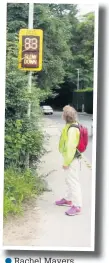  ??  ?? Rachel Mayers checks on a speed indicator on Prestbury Road