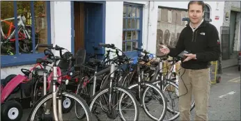  ??  ?? Paul Nolan of Kennys for Bikes with some of the new electric bikes