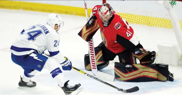  ?? ADRIAN WyLD/THE CANADIAN PRESS ?? Tampa Bay winger Ryan Callahan tries to stickhandl­e the puck past goaltender Craig Anderson on Sunday.