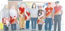  ??  ?? Jennifer (centre), Dr Zainab (fourth left) and others at the English camp.