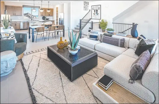  ?? Summerlin ?? For millennial­s and younger homebuyers interested in reducing their footprint, Summerlin’s three-story homes are becoming a popular choice in a mix of single-family and attached home styles.