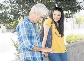  ?? Beth Dubber Orchard ?? THE VOICE, the ’stache — Sam Elliott charms with Laura Prepon in “The Hero.”