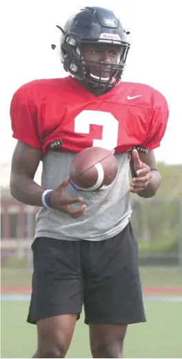  ?? PHOTOS BY ALLEN CUNNINGHAM/FOR THE SUN-TIMES ?? Running back AJ Henning, who has 25 scholarshi­p offers, looks bigger, faster and stronger after bulking up in the offseason.