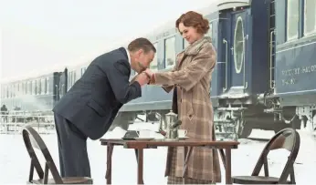  ?? NICOLA DOVE/TWENTIETH CENTURY FOX ?? Hercule Poirot (Kenneth Branagh) and Miss Mary Debenham (Daisy Ridley) share a moment in Twentieth Century Fox’s “Murder on the Orient Express.”
