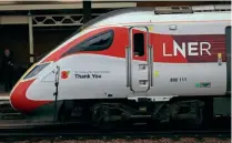  ?? TREVOR HALL ?? Also pictured on October 30, at Doncaster, is LNER Class 800 'Azuma' No. 800111, which has been given poppy vinyls at both ends, along with a thank you message. The same treatment was given last year to No. 800101.