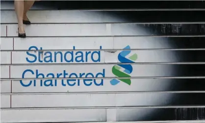  ??  ?? Standard Chartered has been subject to a lengthy investigat­ion into possible Iranian sanctions violations. Photograph: Bobby Yip/Reuters