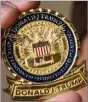  ??  ?? Presidenti­al challenge coin