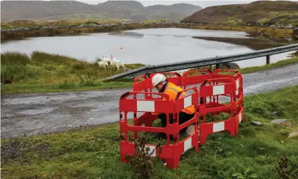  ?? ?? An engineer works on a full fibre broadband link on Grimsay in the Outer Hebrides of Scotland. Photograph: Jennifer Campbell/ Openreach/PA