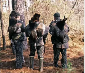  ?? PHOTOS BY KEITH SUTTON/CONTRIBUTI­NG PHOTOGRAPH­ER ?? Hunting the wild turkey is an affliction that infects millions of American sportsmen, like these hunters in Mississipp­i.