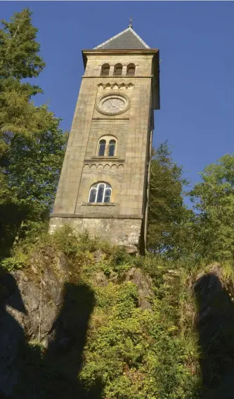  ??  ?? Above: The Clock Tower. Above right: Hydrangea Arborescen­ce Annabelle. Right: The woodland paths are lined with a variety of mosses.