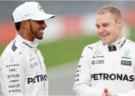  ??  ?? Mercedes F1 drivers Lewis Hamilton (left) and Valtteri Bottas.