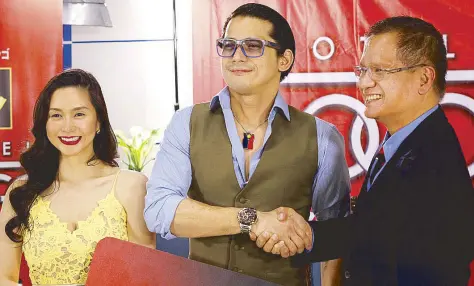  ??  ?? With wife Mariel Rodriguez signing up as ambassador­s of Hotel Sogo (which is reposition­ing as a family-oriented destinatio­n) and (right) as new endorser of Northern Cement…