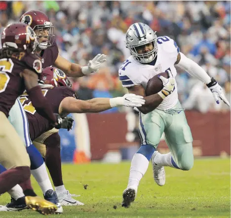  ?? PATRICK SMITH/GETTY IMAGES ?? Cowboys running back Ezekiel Elliott ran for 150 yards and two touchdowns against Washington Sunday at FedEx Field in Landover, Md., which could end up being his last action for the next few weeks. Another hearing over his six-game suspension looms on...