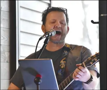  ?? Staff photo/Teresa Dowling ?? St. Marys native Nick Wilson sings during his Feb. 13 performanc­e at GR8 Vines Winery. Following COVID restrictio­ns, live entertainm­ent is safely returning.