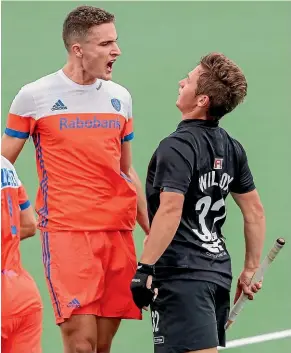  ?? PHOTOSPORT ?? Netherland­s’ Jonas de Geus squares up to Black Stick Mac Wilcox during the clash between the two teams yesterday.