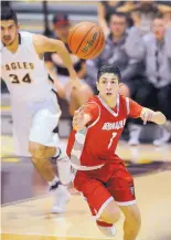  ?? JIM THOMPSON/JOURNAL ?? Point guard Luis Villegas reaches for a loose ball Thursday night in Bernalillo’s road game at Belen, where the Eagles won 61-54.