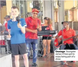  ??  ?? Onstage Youngster James O’Hara got to enjoy being part of a show