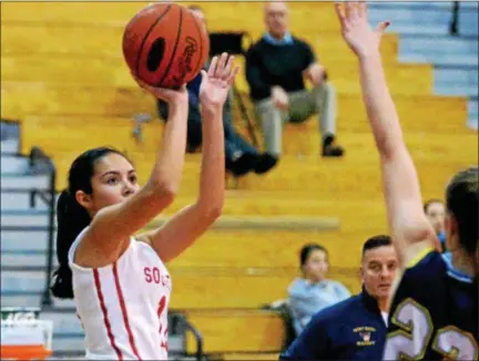  ?? BOB RAINES — DIGITAL FIRST MEDIA ?? Souderton’s Alana Cardona takes a shot against St. Basil.