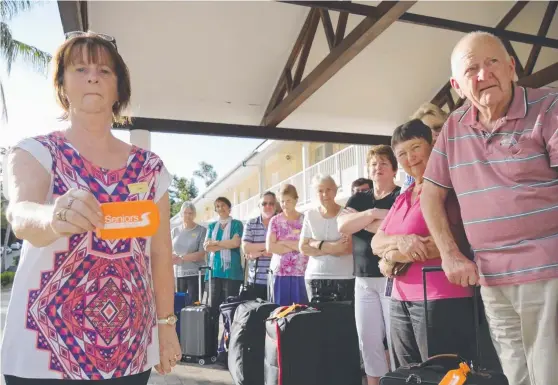  ?? NOT HAPPY: Lyn Jacobson and some of the 26 seniors stranded in Airlie Beach after their tour operator collapsed. Picture: JESSICA LAMB ??