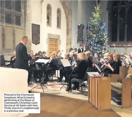  ??  ?? Pictured is the Charnwood Symphonic Wind Orchestra performing at the Mayor of Charnwood’s Christmas Carol Service at All Saints with Holy Trinity church in Loughborou­gh in a previous year