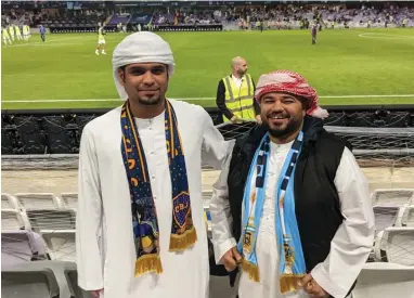  ?? PHOTOS: PERFIL CEDOC ?? Nabhan Almadhani on the left, cheering on Boca Juniors in Al Ain.
