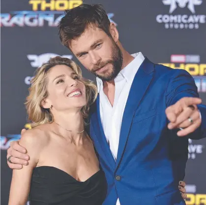  ?? Picture: AP ?? Thor star Chris Hemsworth, with his wife Elsa Pataky, at the world premiere of Thor: Ragnarok in LA.