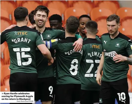  ?? Dave Rowntree/PPAUK ?? > Ryan Hardie celebrates scoring for Plymouth Argyle on his return to Blackpool