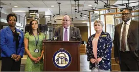  ?? ALYSSA POINTER / ALYSSA.POINTER@AJC.COM ?? Vernon Keenan, director of the Georgia Bureau of Investigat­ion, speaks at Wednesday’s news conference on youth suicide prevention held at GBI headquarte­rs in Decatur. With Keenan were (from left): Sakema Harmom, assistant division director of field operations; Teressa Stann, founder of the LRJ Foundation, a local nonprofit that focuses on suicide prevention; Cheryl Benefield of the Department of Education; and Walker Tisdale, director of suicide prevention at Georgia Department of Behavioral Health and Developmen­tal Disabiliti­es.