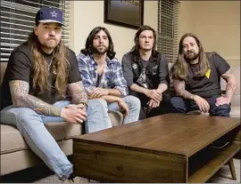  ?? Shane Kislack For The Times ?? THRASH metal band Power Trip — from left, Nick Stewart, Blake Ibanez, Chris Ulsh and Chris Whetzel — in Dallas. The band has its first Grammy nomination.