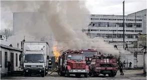  ?? | EPA ?? FIREFIGHTE­RS work at the scene of an explosion after a shelling in Kharkiv, Ukraine. Russia has not been afforded the opportunit­y to tell its side in western media which seems to set the tone in almost all forms of media, the writer says.