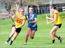  ?? Photo / Lou Kibby Photograph­y ?? Te Awamutu’s Mackenzie Harris (23) with the ball for Waikato, with Georgia Young in support, against Auckland A at the New Zealand U15 Nationals.