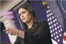  ?? Win McNamee / Getty Images ?? White House Press Secretary Sarah Huckabee Sanders answered queries about Trump’s NFL tweets during a briefing.