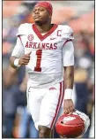  ?? (NWA Democrat-Gazette/Hank Layton) ?? Arkansas quarterbac­k KJ Jefferson, who announced Friday his intention to return next season, has advanced into the top 10 in the UA record books in multiple categories.