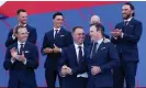  ?? ?? Justin Thomas embraces the US captain Zach Johnson during the opening ceremony. Photograph: Andrew Redington/Getty Images