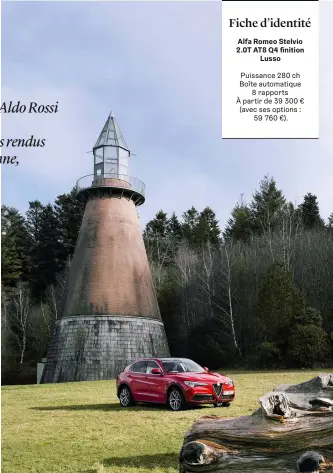  ??  ?? L’ALFA ROMEO STELVIO, flambant rouge, devant le phare érigé par Aldo Rossi sur l’île de Vassivière.