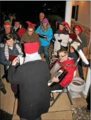  ?? MARTHA GEHRINGER — FOR DIGITAL FIRST MEDIA ?? The Most Blessed Sacrament choir sang Christmas carols during the Bally Christmas tree lighting.